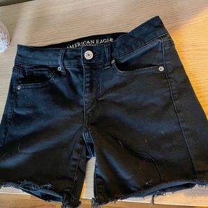 American Eagle Midi black distressed jean shorts size 4